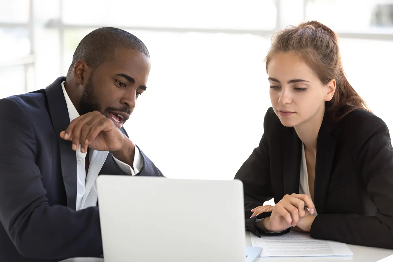 A sales leader participating in a coaching session