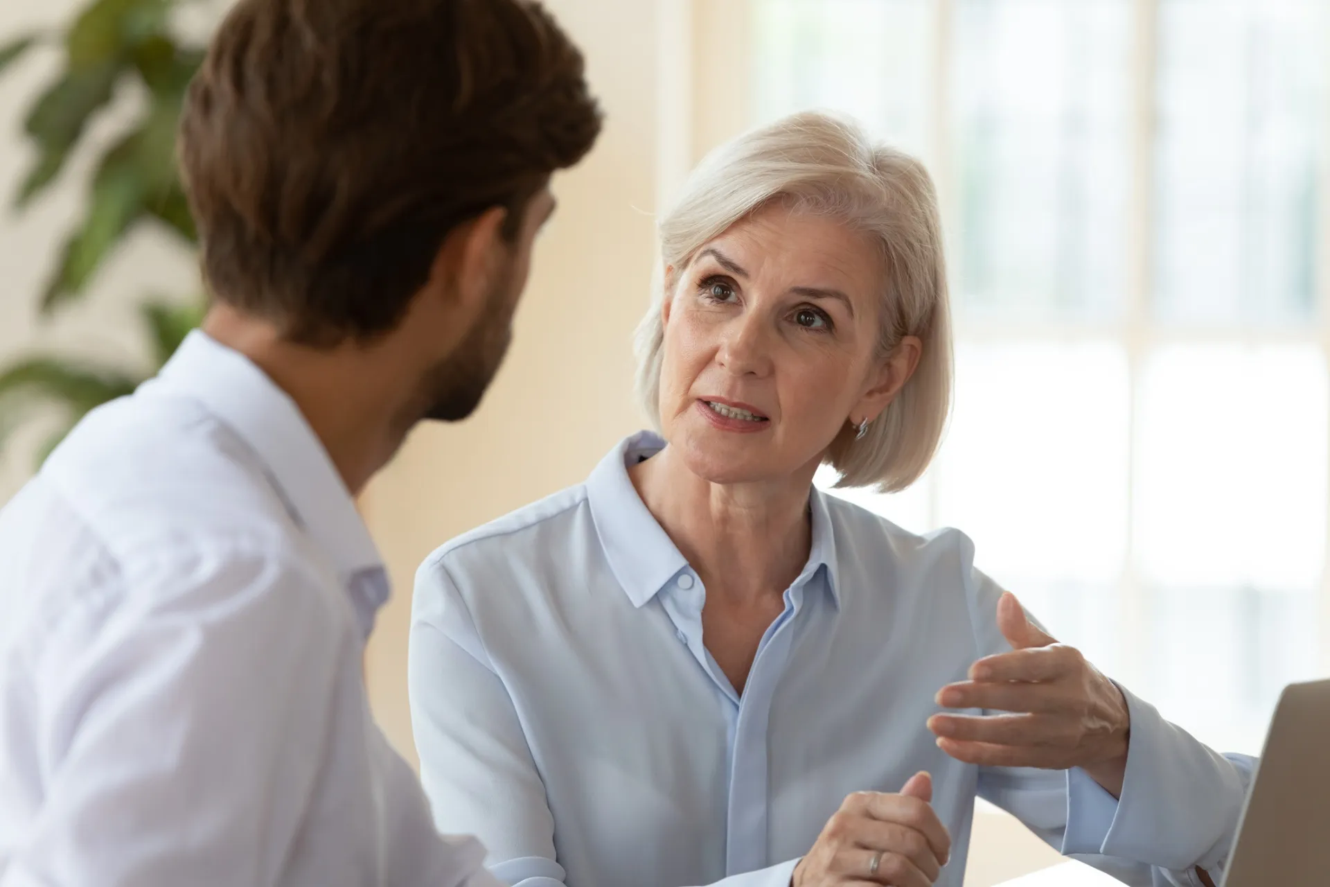 Senior living sales leader coaching a sales professional